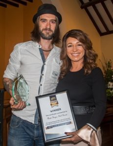 Love Oxted Here to Help Awards Above and Beyond winner Matt Hayes of Idol hands with special guest and speaker Jacqueline Gold (Photo: SMS Creative Photography)